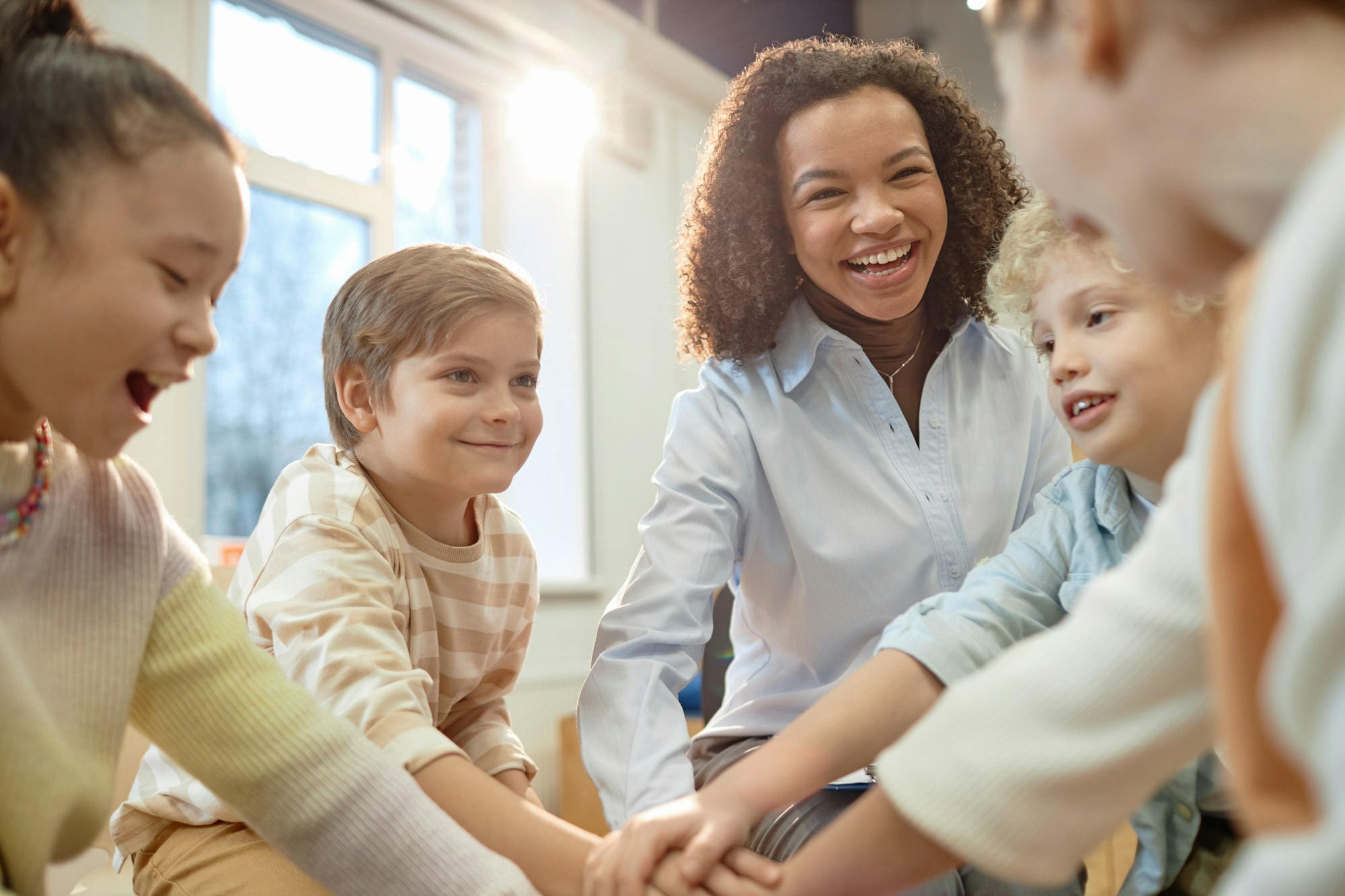 Group of Excited Children Huddling